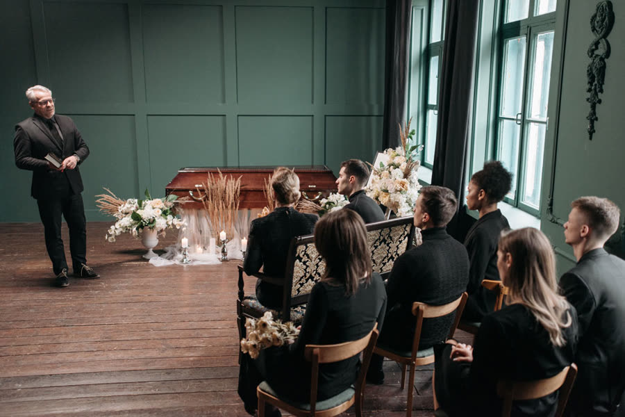 An atmospherically arranged funeral hall with flowers