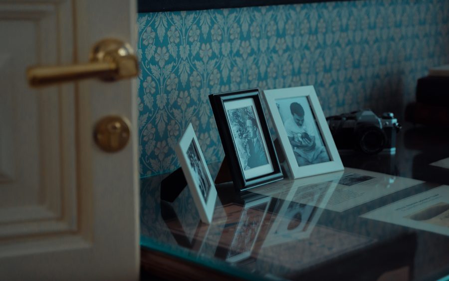 Framed family photos ready for the photo presentation