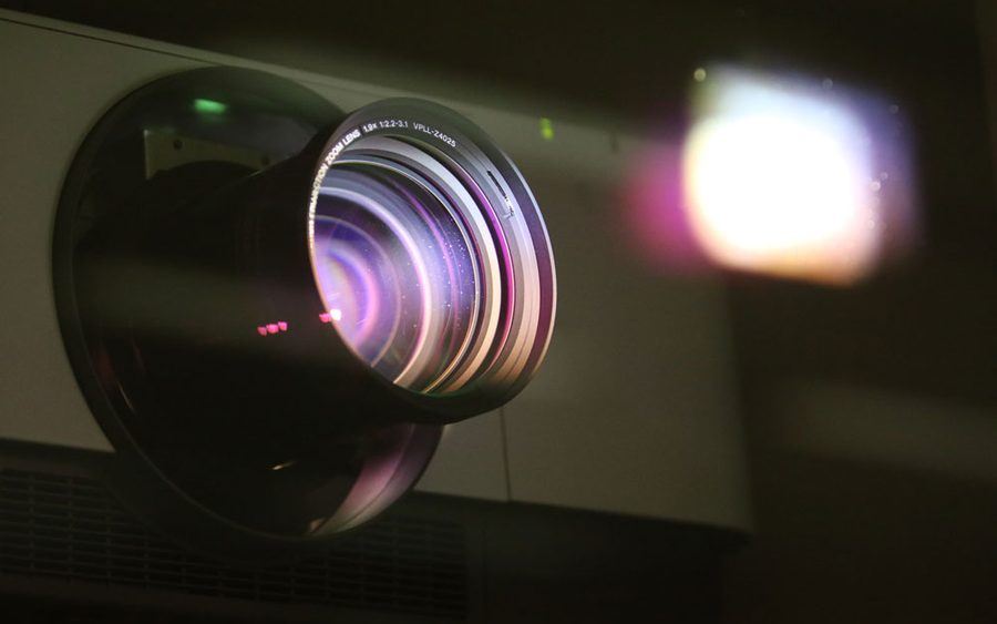 Projector playing the presentation at the funeral venue